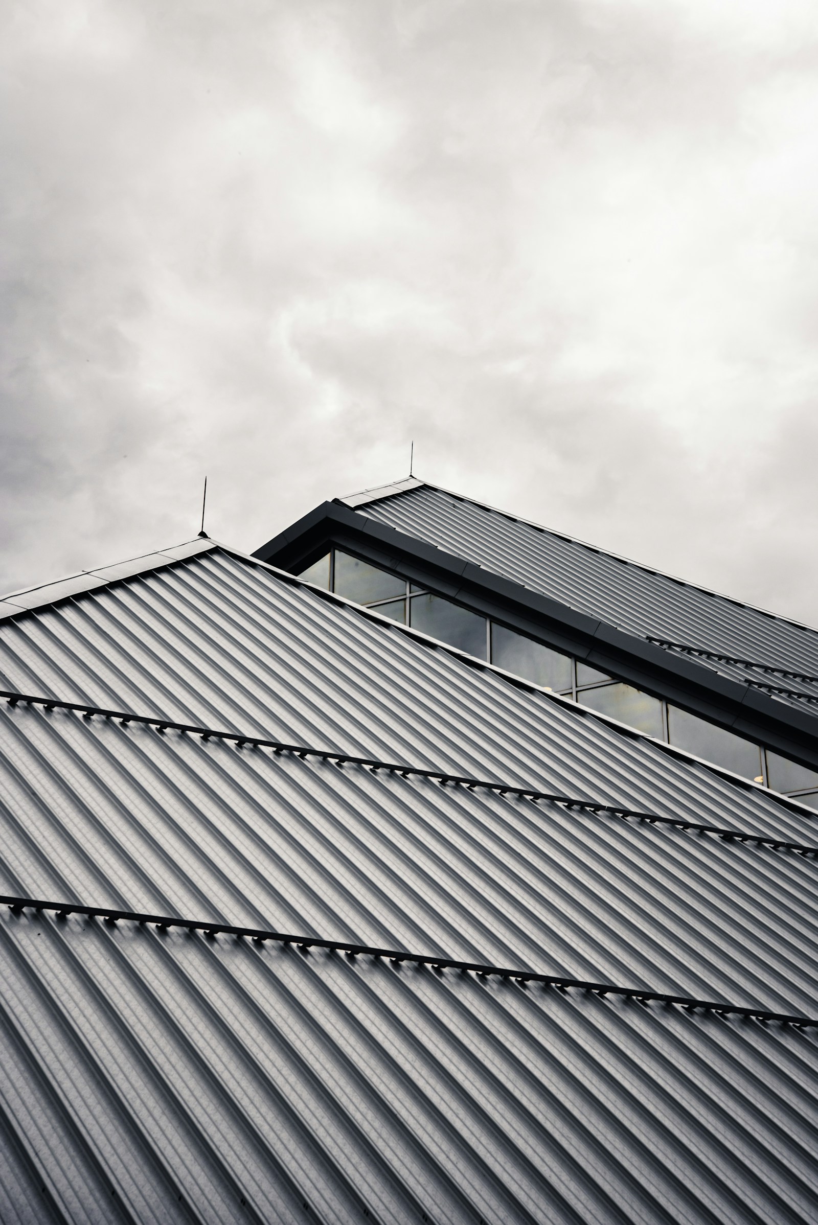Modern standing-seam metal roof with clean ridge lines