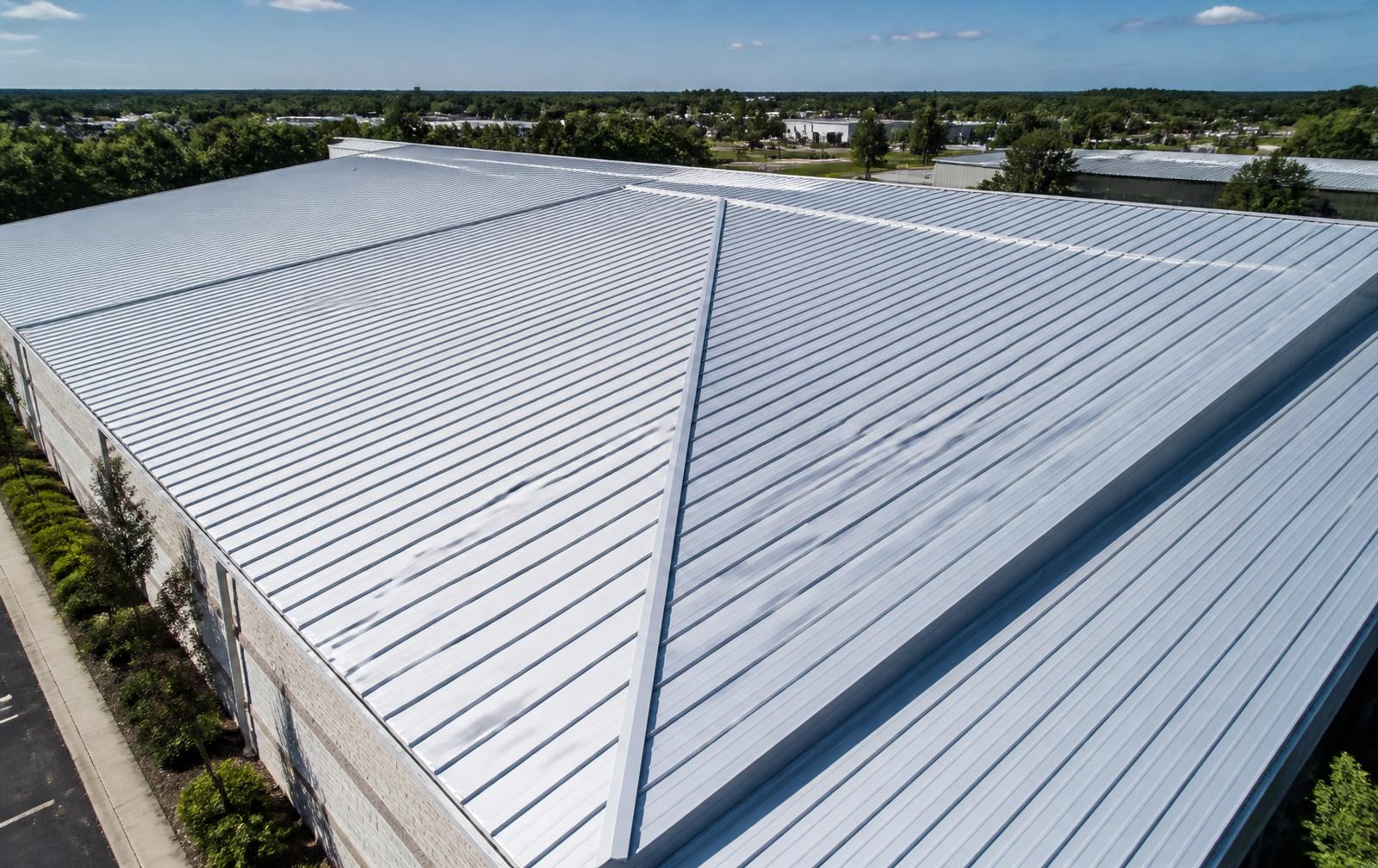 Clean commercial standing-seam metal roof after restoration work